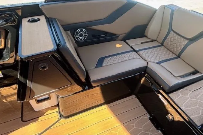 Slide: The Image of 2026 Yamaha Boats 255XD interior with stylish seating and modern design. - 23