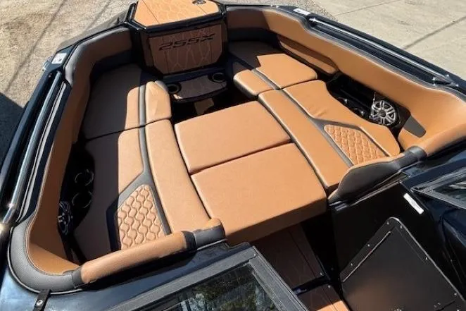 Slide: The Image of 2026 Yamaha Boats 255XD interior with tan leather seating and modern design. - 9