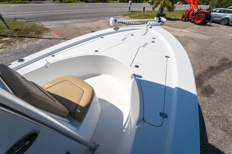 Slide: The Image of 2016 Sportsman Masters 207 Bay Boat with tan seating and spacious deck. - 19