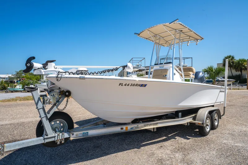 Slide: The Image of 2016 Sportsman Masters 207 Bay Boat on trailer, sunny day, clear blue sky. - 8