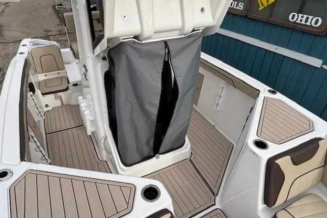 Slide: The Image of 2026 Yamaha Boats 222 FSH Sport E interior with sleek seating and modern design. - 9