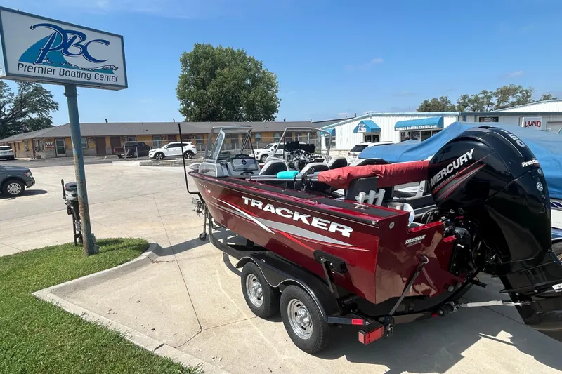 Slide: The Image of 2016 Tracker Targa V-18 Combo boat at Premier Boating Center parking lot. - 3
