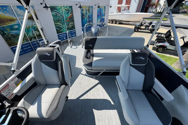 Slide: The Image of 2026 Bennington 22 SSB pontoon boat interior with modern seating and sleek design. - 30