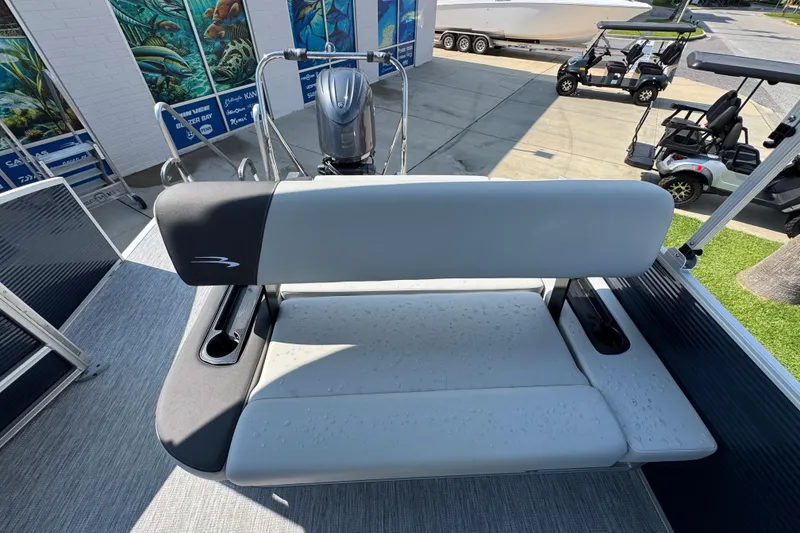 Slide: The Image of 2026 Bennington 22 SSB boat seat with modern design and outdoor setting. - 31