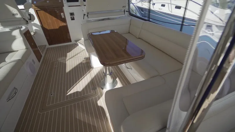 Slide: The Image of Luxurious interior of 2021 MJM 53z yacht with elegant seating and wooden table. - 17