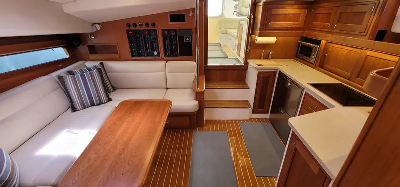 Slide: The Image of Luxurious interior of 2021 MJM 53z yacht with kitchen and seating area. - 28