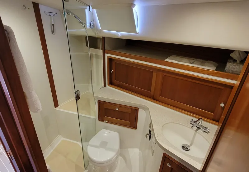 Slide: The Image of Luxurious bathroom in 2021 MJM 53z yacht with wooden cabinetry and modern fixtures. - 33