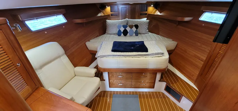 Slide: The Image of Luxurious cabin interior of 2021 MJM 53z yacht with cozy bed and seating. - 34