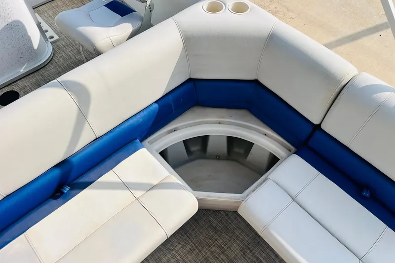 Slide: The Image of 2019 SunCatcher V322 RF boat dashboard with steering wheel and control panel. - 26