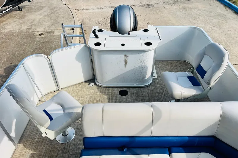 Slide: The Image of 2019 SunCatcher V322 RF boat interior with seating and rod holders. - 29