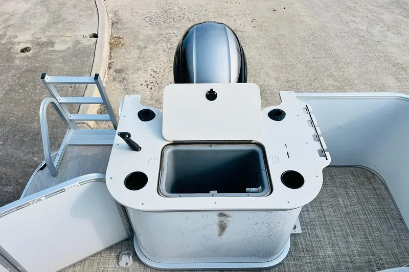 Slide: The Image of 2019 SunCatcher V322 RF boat deck with ladder and engine view. - 33