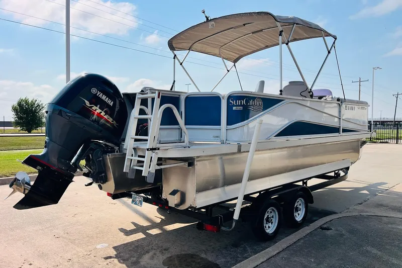 Slide: The Image of 2019 SunCatcher V322 RF pontoon boat with Yamaha outboard motor on trailer. - 7