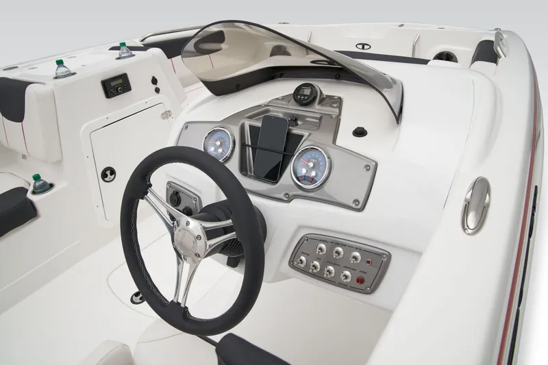 Slide: The Image of Manufacturer Provided Image: 2025 Tahoe 2150 boat interior with modern dashboard and steering wheel. - 29