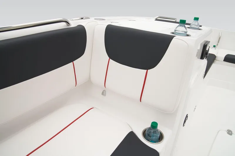 Slide: The Image of Manufacturer Provided Image: 2025 Tahoe 2150 boat interior with black and white seating, red accents, and cup holders. - 39