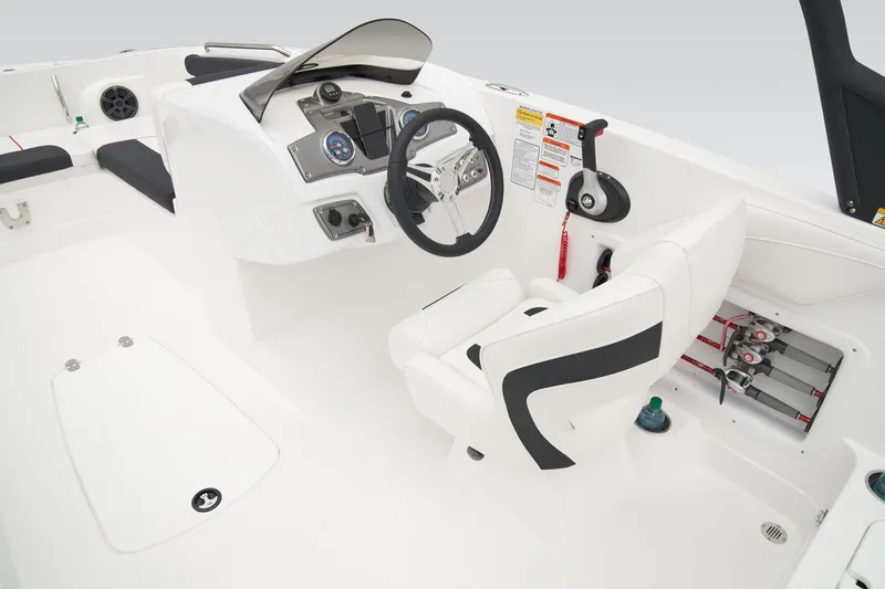 Slide: The Image of Manufacturer Provided Image: 2025 Tahoe 2150 boat cockpit with steering wheel, control panel, and seating. - 51