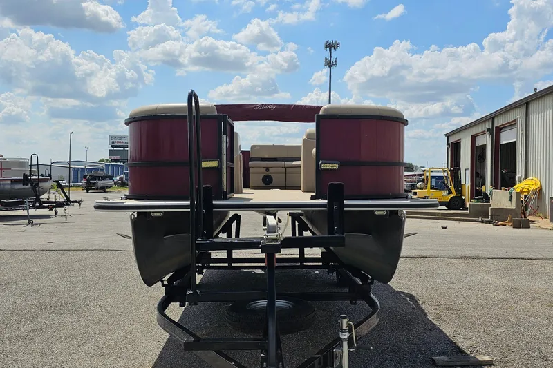 Slide: The Image of 2021 Bentley Pontoons 200 CRUISE on trailer, parked outdoors under a cloudy sky. - 3