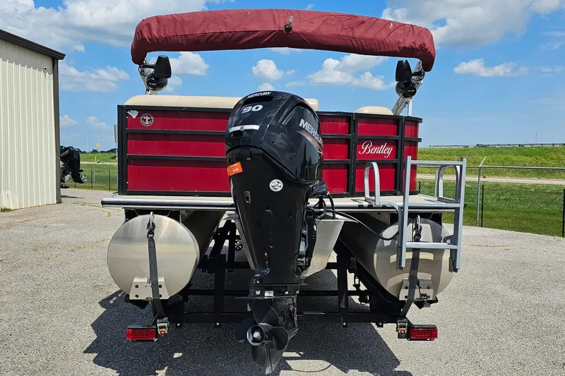 Slide: The Image of 2021 Bentley Pontoons 200 CRUISE with Mercury 90 engine, parked outdoors. - 4