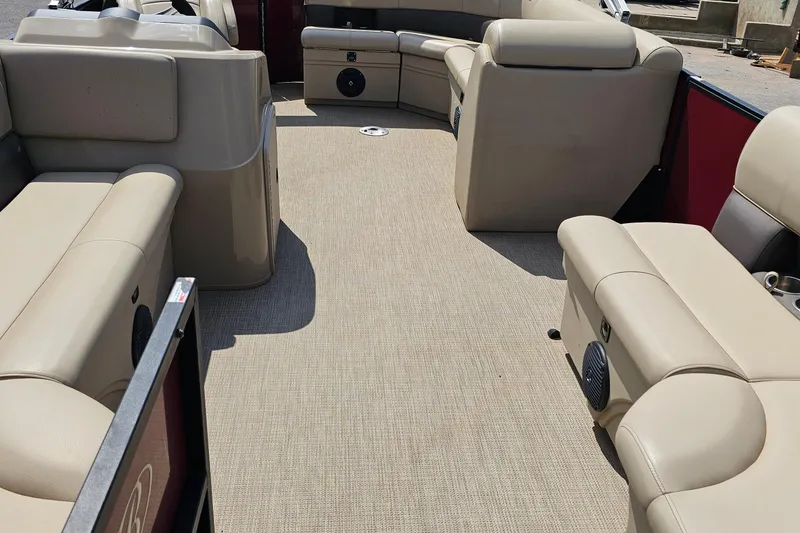 Slide: The Image of 2021 Bentley Pontoons 200 CRUISE interior with beige seating and spacious layout. - 6