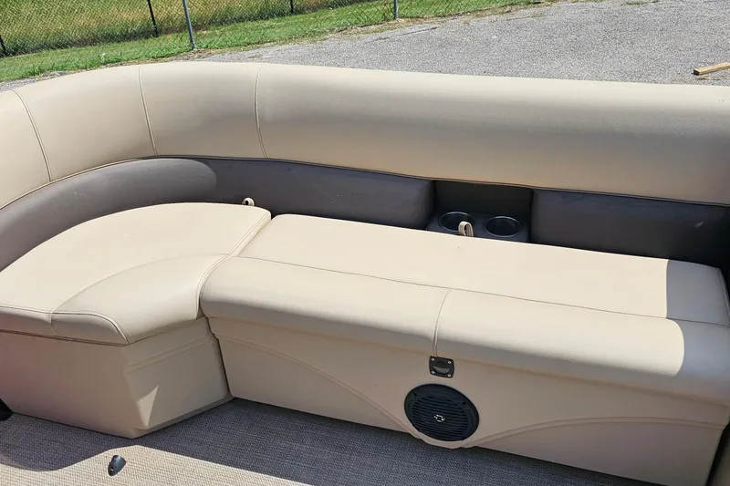 Slide: The Image of 2021 Bentley Pontoons 200 CRUISE beige seating with cup holders and speaker. - 8