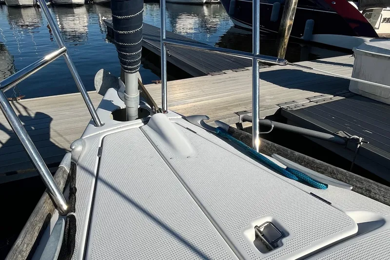 Slide: The Image of Bow of 1994 Beneteau First 35s7 sailboat docked at marina. - 16