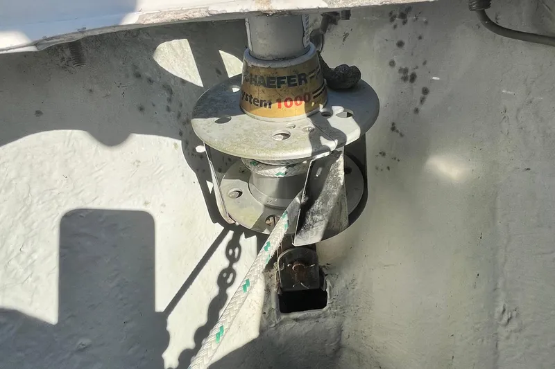 Slide: The Image of Anchor windlass on 1994 Beneteau First 35s7 sailboat deck. - 19