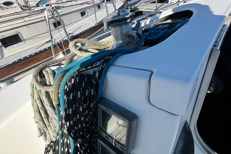 Slide: The Image of Deck of 1994 Beneteau First 35s7 sailboat with ropes and winch. - 26