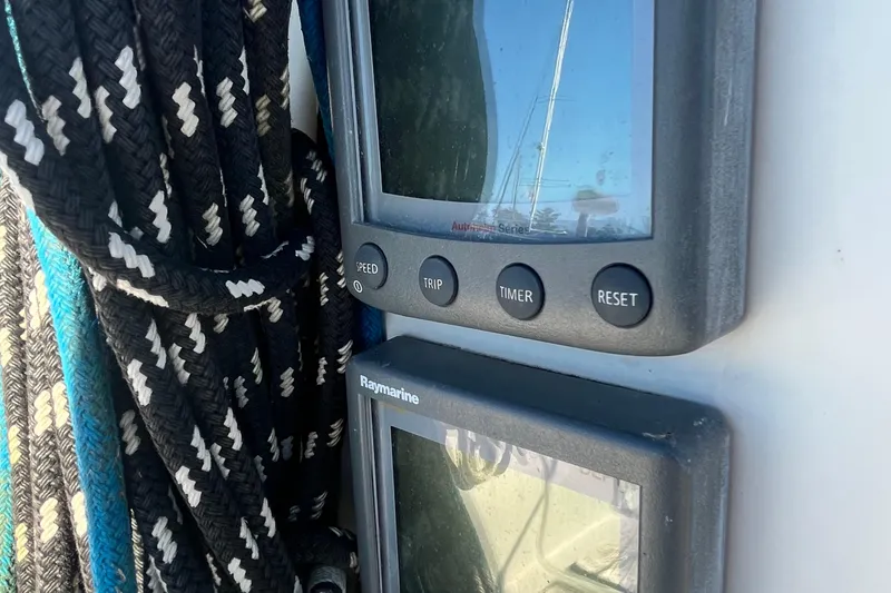 Slide: The Image of Close-up of Raymarine instruments and ropes on a 1994 Beneteau First 35s7 sailboat. - 27