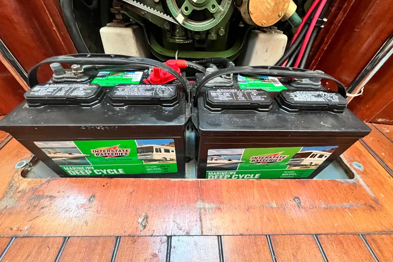 Slide: The Image of Marine deep cycle batteries in a 1994 Beneteau First 35s7 sailboat engine compartment. - 70