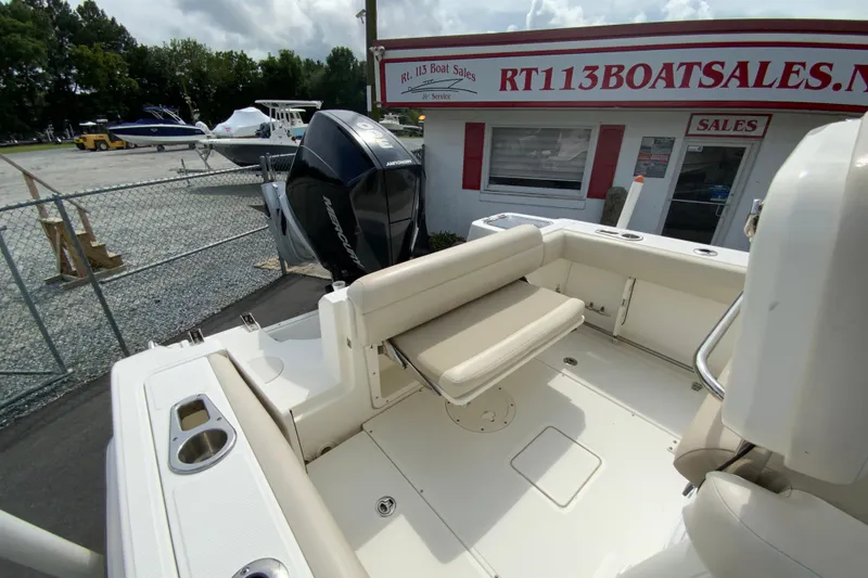 Slide: The Image of 2019 Boston Whaler 230 Outrage boat at dealership with Mercury engine. - 12