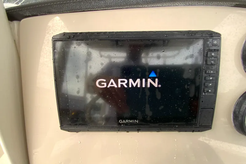 Slide: The Image of Garmin display on 2019 Boston Whaler 230 Outrage boat, wet with water droplets. - 32