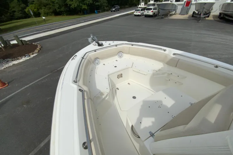 Slide: The Image of 2019 Boston Whaler 230 Outrage boat interior, showcasing spacious seating and sleek design. - 38