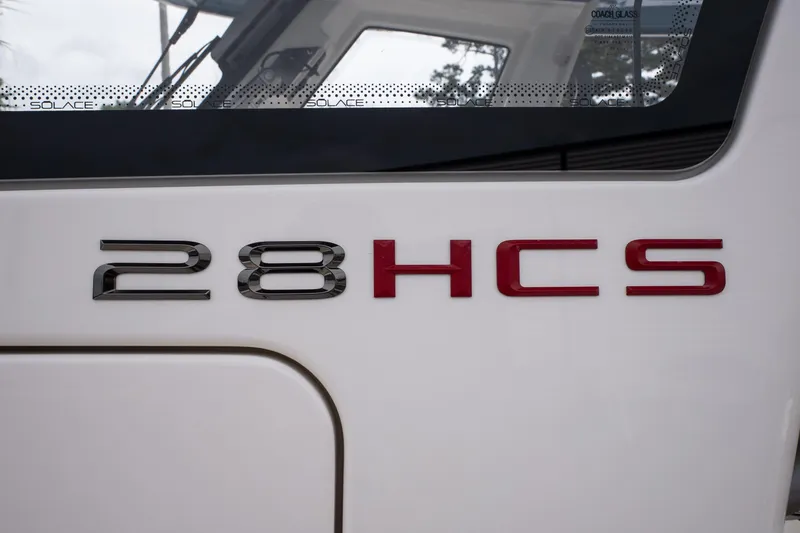 Slide: The Image of 2026 Solace 28 HCS model emblem on a white surface. - 24