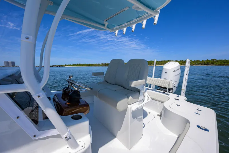 Slide: The Image of 2024 Conch 25 boat interior with seating and ocean view. - 16