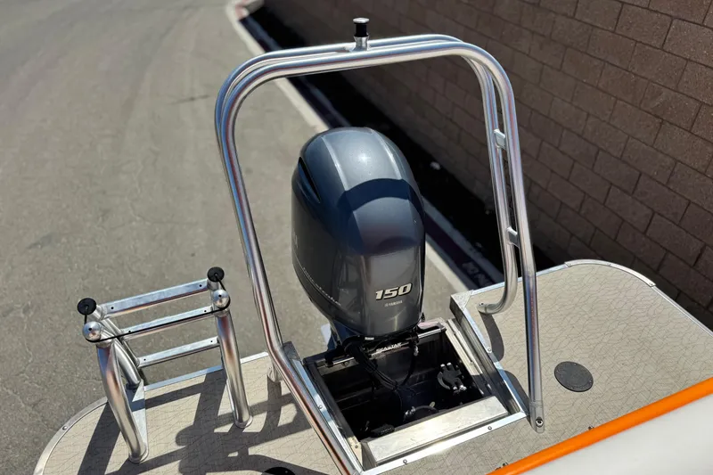 Slide: The Image of 2022 Aloha Pontoon 230 with Yamaha 150 outboard motor and stainless steel ladder. - 17