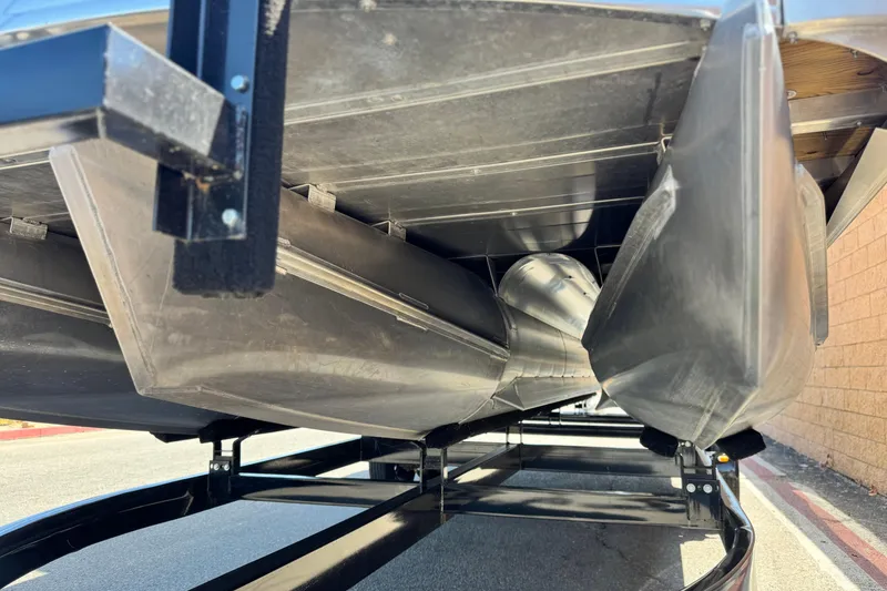 Slide: The Image of Underneath view of a 2022 Aloha Pontoon 230 on a trailer. - 3