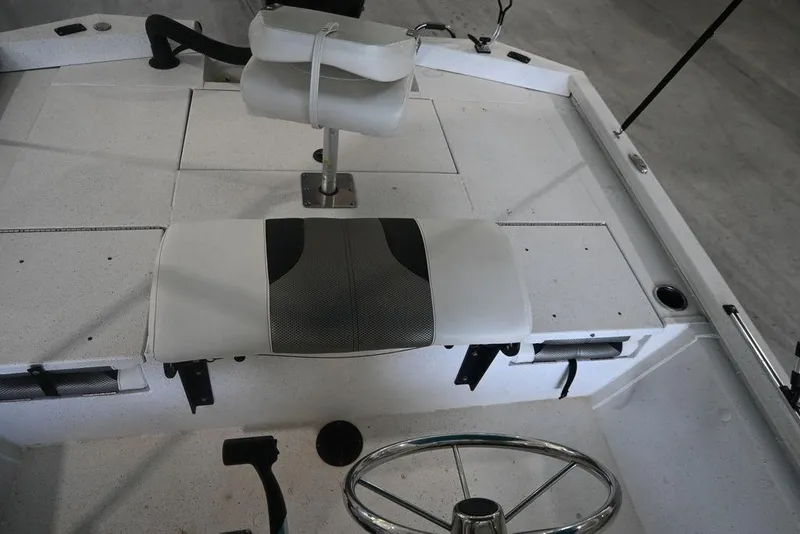 Slide: The Image of 2020 Vexus AVX1980CC boat interior with steering wheel and seating. - 11