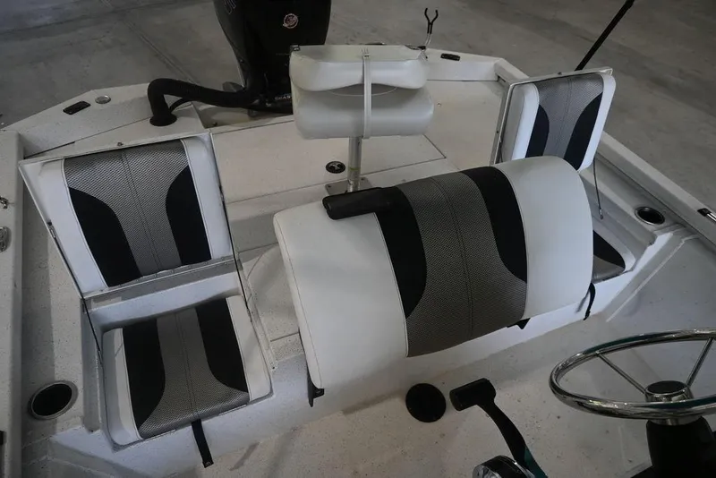 Slide: The Image of 2020 Vexus AVX1980CC boat interior with stylish seating and steering wheel. - 6