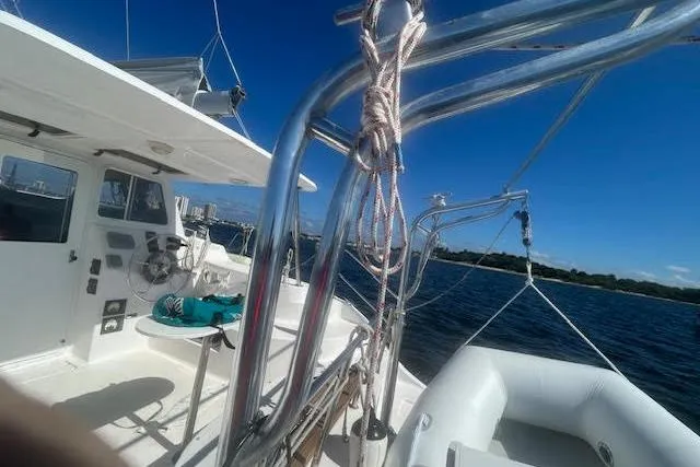 Slide: The Image of Sailing yacht Gemini Legacy 2013 on water with clear blue sky. - 17