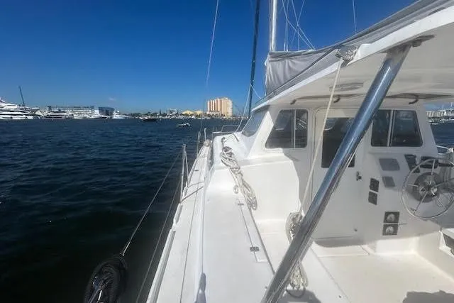 Slide: The Image of Sailing yacht Gemini Legacy 2013 on calm waters under clear blue sky. - 29