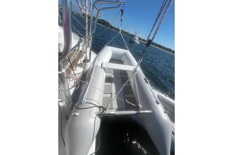 Slide: The Image of Inflatable boat on water, Gemini Legacy 2013 model, with clear blue sky. - 36