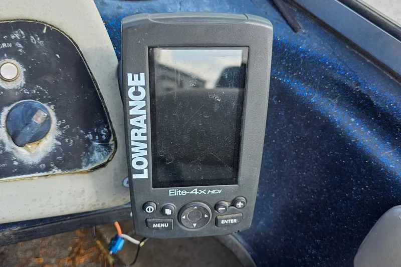 Slide: The Image of Lowrance Elite-4X HDI fishfinder on 2004 ProCraft 180 Combo boat dashboard. - 13