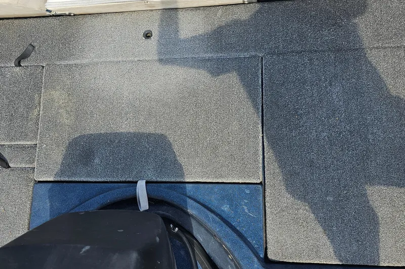 Slide: The Image of 2004 ProCraft 180 Combo boat deck with shadow and textured surface. - 19