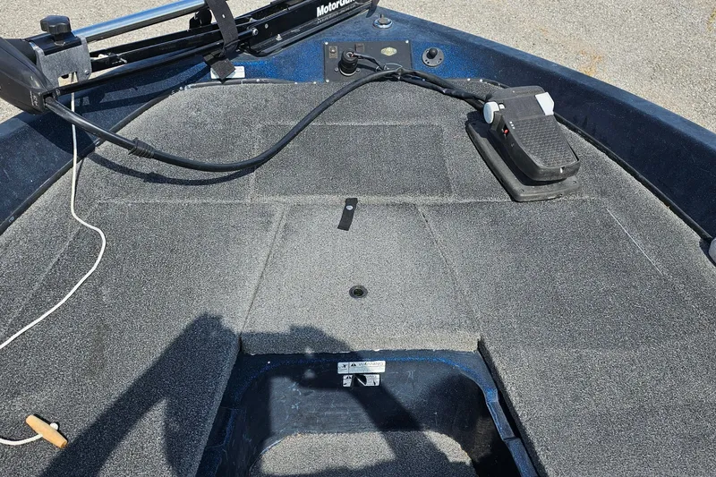 Slide: The Image of 2004 ProCraft 180 Combo boat deck with trolling motor and foot pedal. - 6