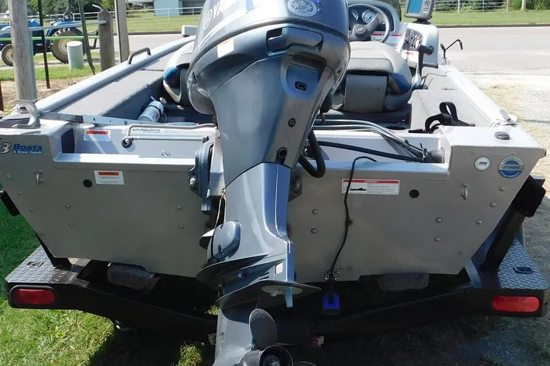 Slide: The Image of 2009 Eagle G3 175 PF boat with Yamaha outboard motor on trailer. - 6