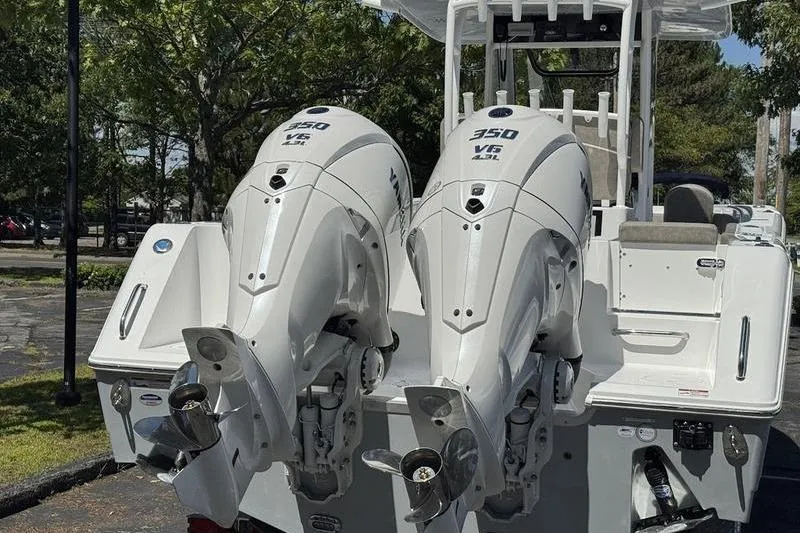 Slide: The Image of 2026 Sea Hunt Gamefish 30 with twin 350 V6 engines, rear view. - 3