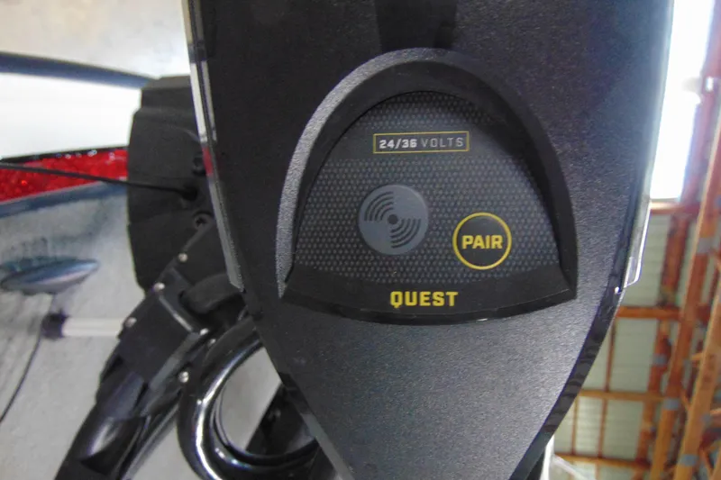 Slide: The Image of Close-up of a 2005 Triton Tr-196 PD boat control panel with Quest pairing feature. - 13
