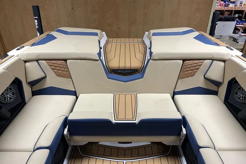 Slide: The Image of 2025 Nautique Super Air Nautique S23 interior with luxurious seating and stylish design. - 9