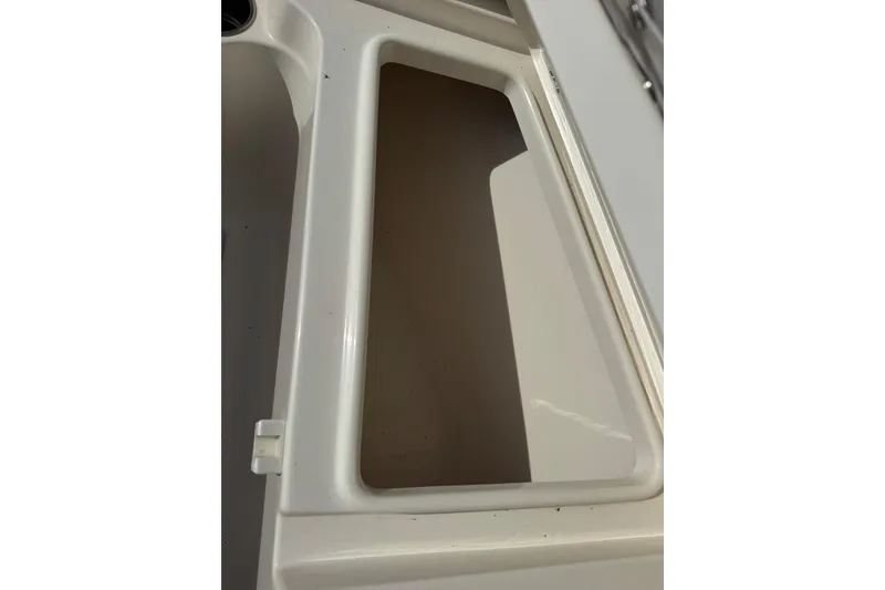 Slide: The Image of 2023 Key West 203 DFS boat interior compartment detail, white finish. - 25