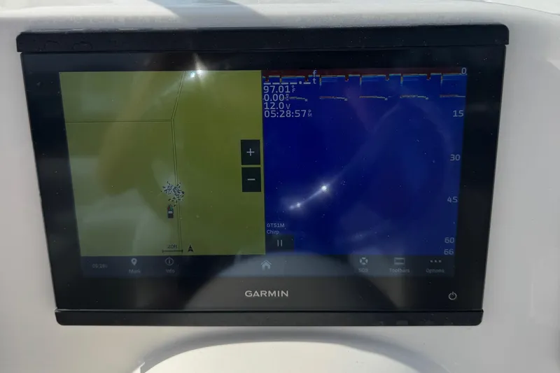 Slide: The Image of Garmin marine display on 2023 Key West 203 DFS boat, showing navigation and sonar data. - 9