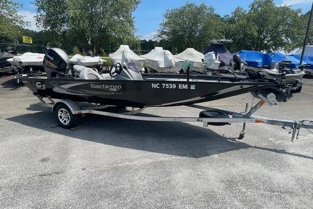 Slide: The Image of 2019 G3 Sportsman 1710 boat on trailer, parked outdoors. - 10